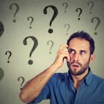 Should I Repair or Replace My Furnace?- Thoughtful confused handsome man has too many questions and no answer